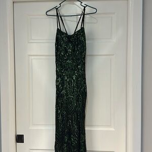 Black evening gown with green sequins